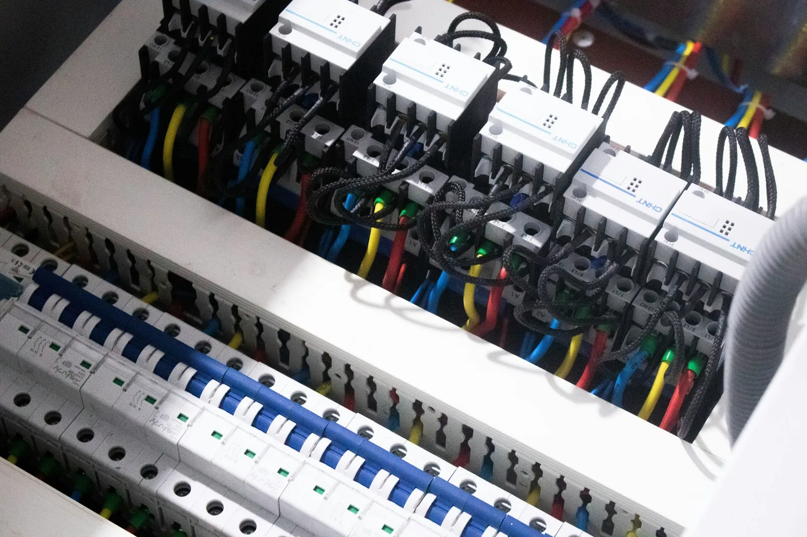 Close-up of circuit breakers and wiring inside an electrical panel — illustrative stock photo, not an actual East Valley job site